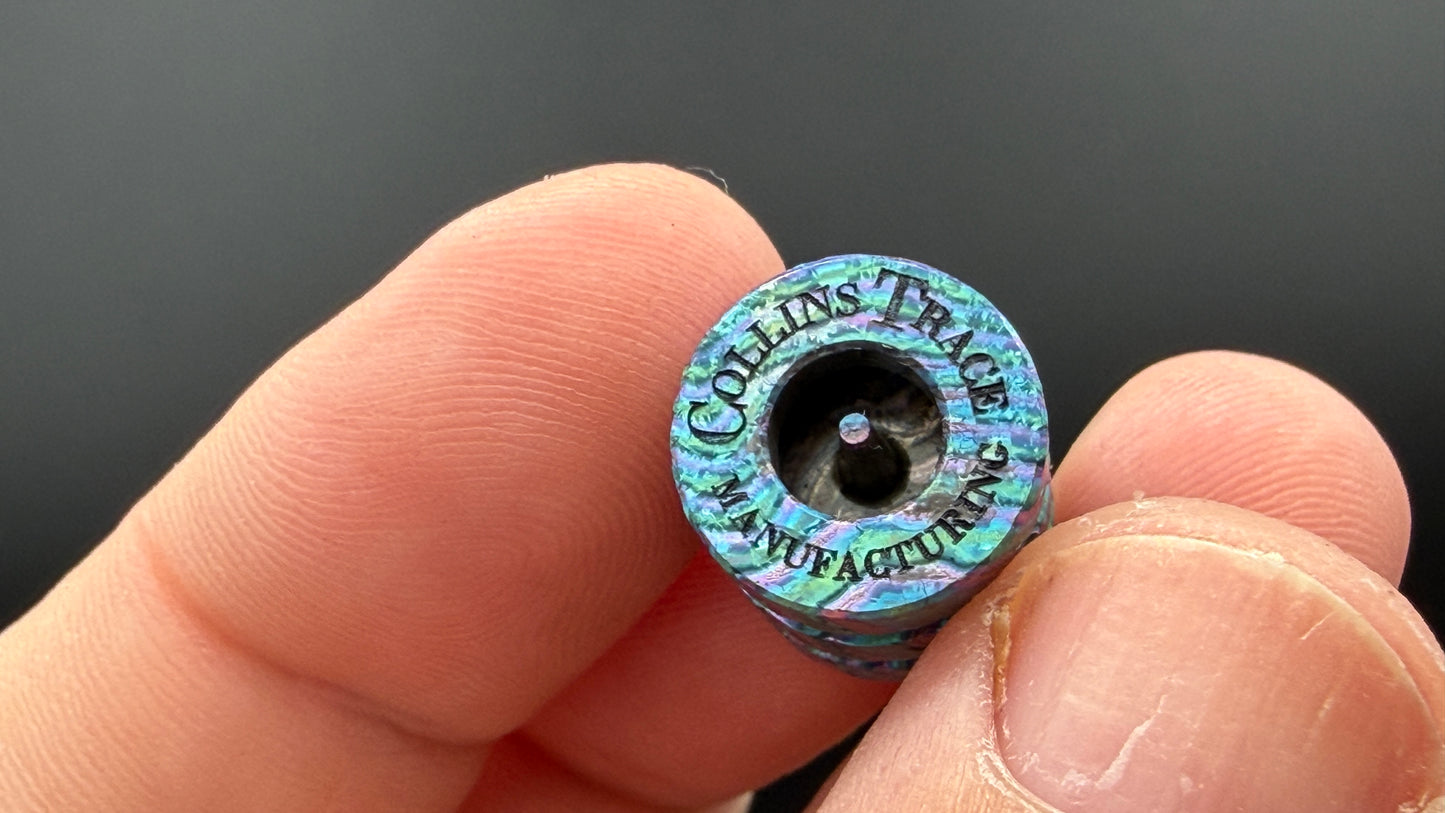 Purple, blue and green Zircuti two line The End Bead