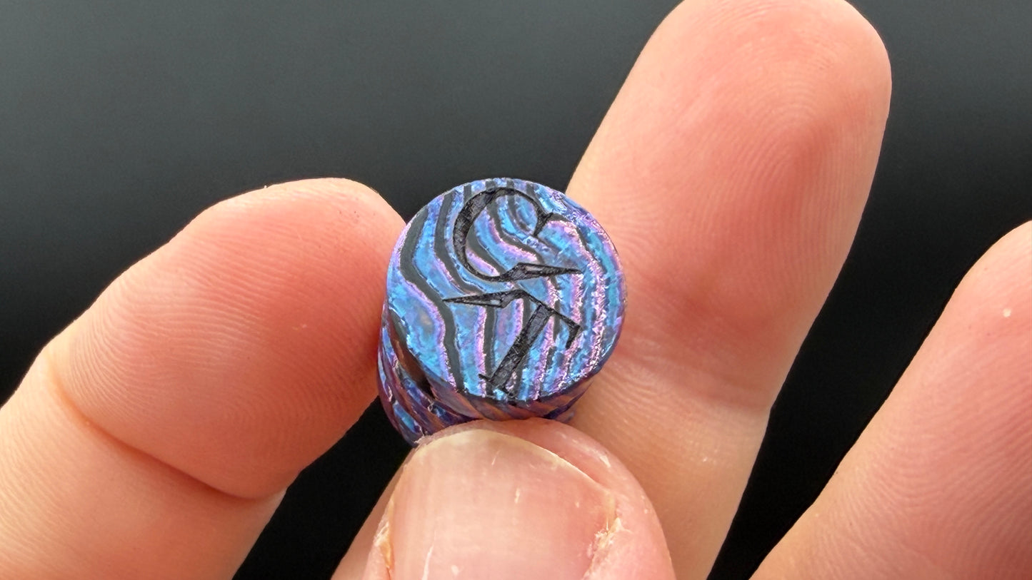 Purple, blue and pink Zircuti two line The End Bead