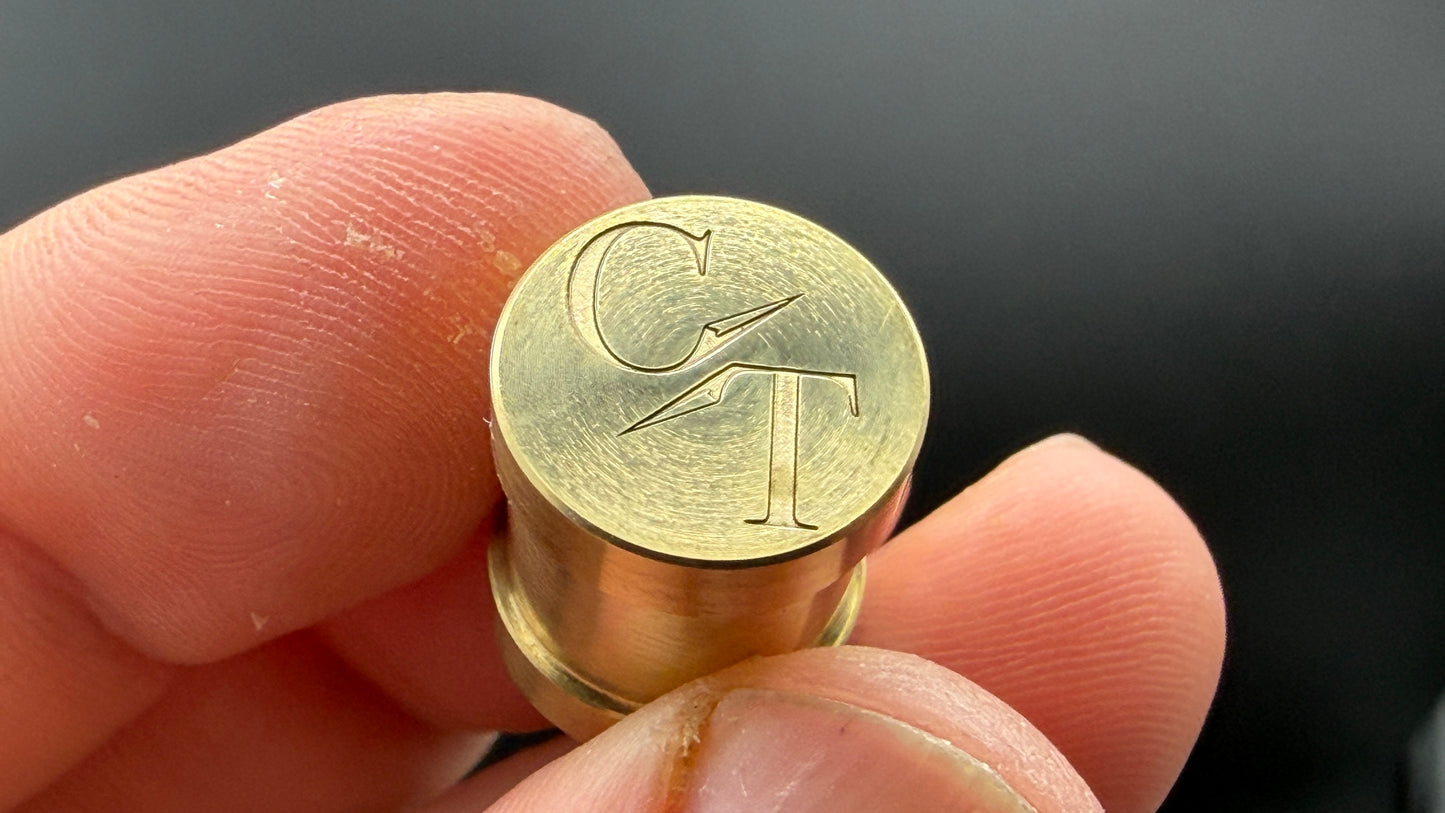 Brass spool engraved logo