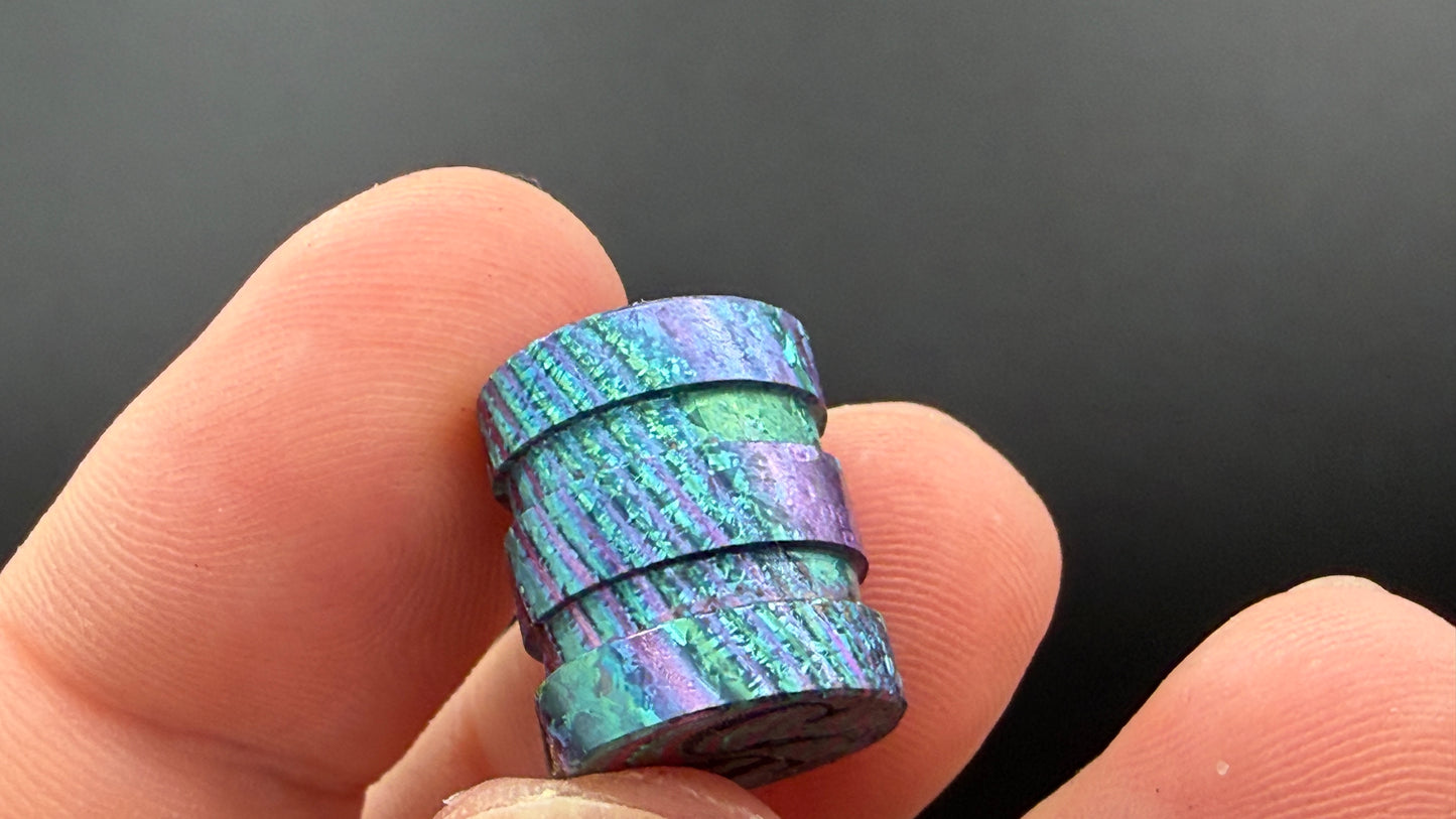 Purple, blue and green Zircuti two line The End Bead