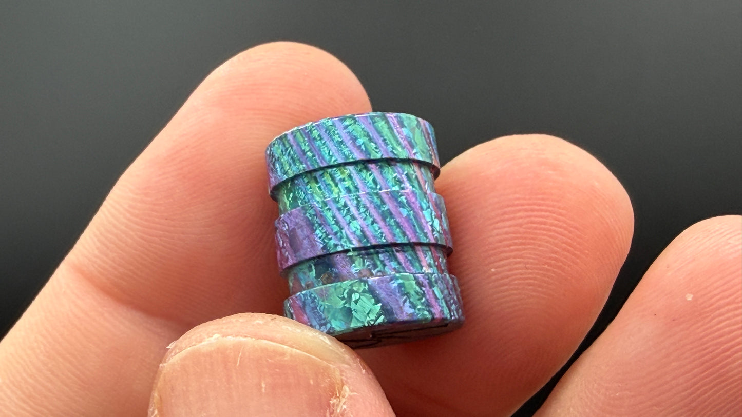 Purple, blue and green Zircuti two line The End Bead
