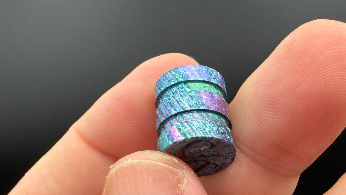 Purple, blue and green Zircuti two line The End Bead
