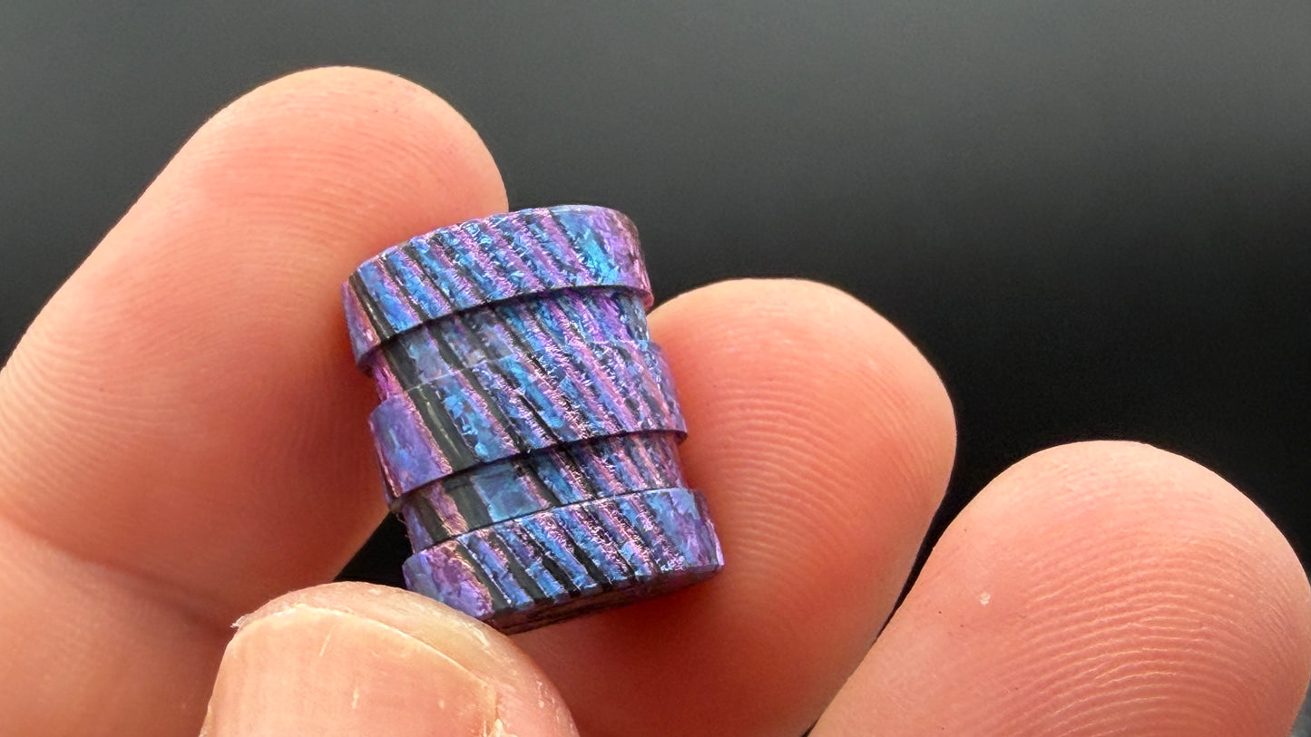 Purple, blue and pink Zircuti two line The End Bead