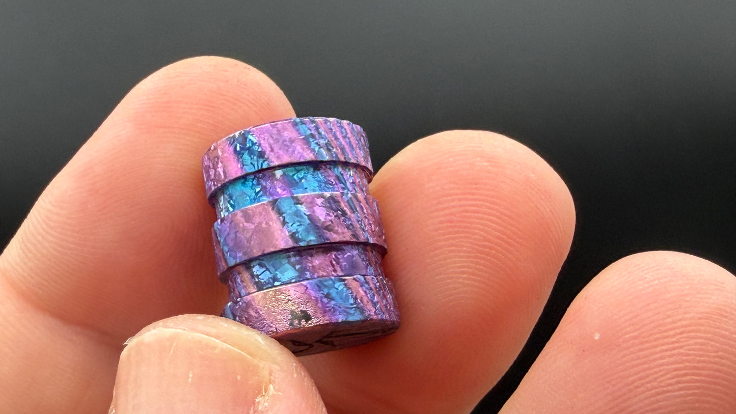 Purple, blue and pink Zircuti two line The End Bead