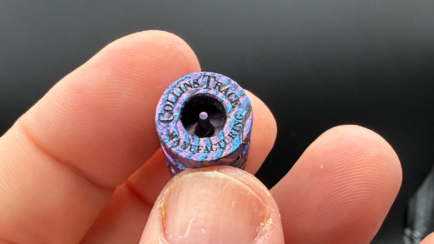 Purple, blue and pink Zircuti two line The End Bead