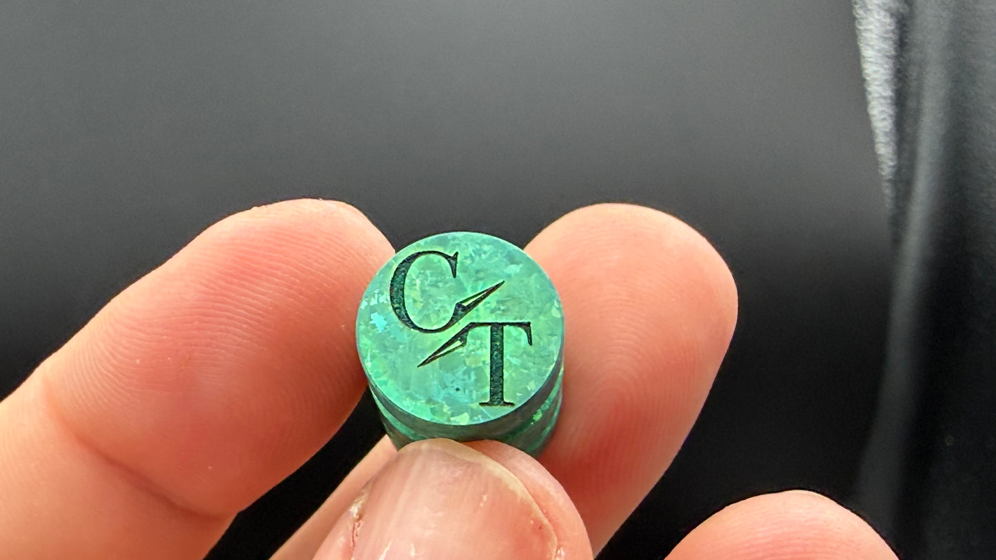 Green Crystal Titanium two line The End Bead