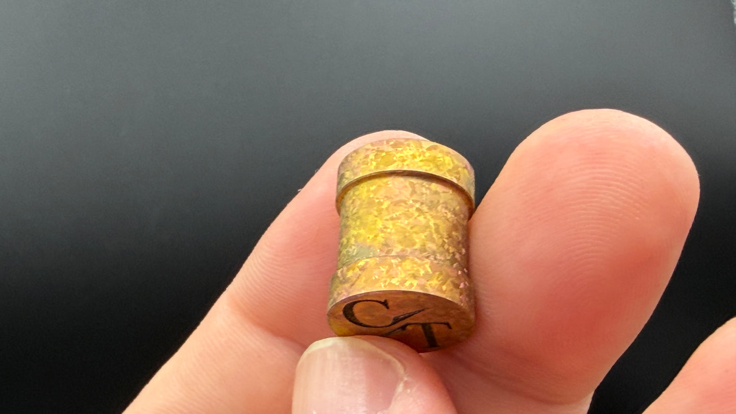 Orange to Rose Gold Crystal Titanium spool The End Bead