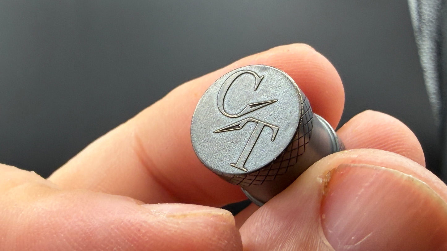 Antique Brass spool with Knurling raised logo