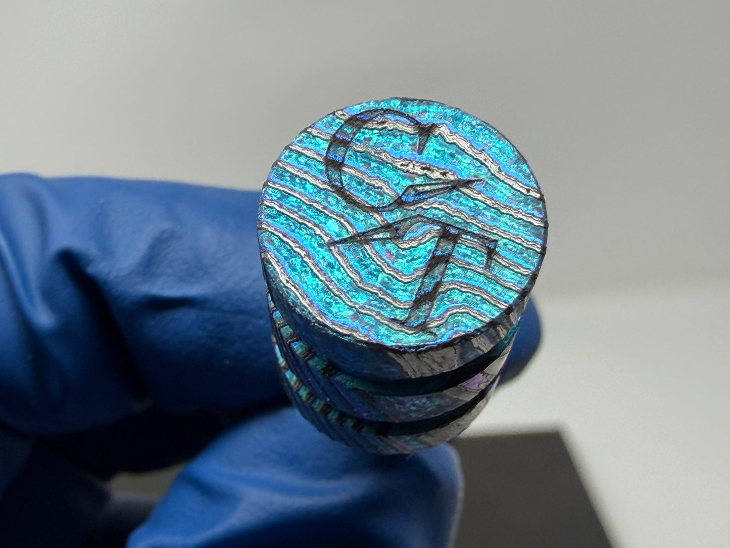 Teal Zircuti two line The End Bead