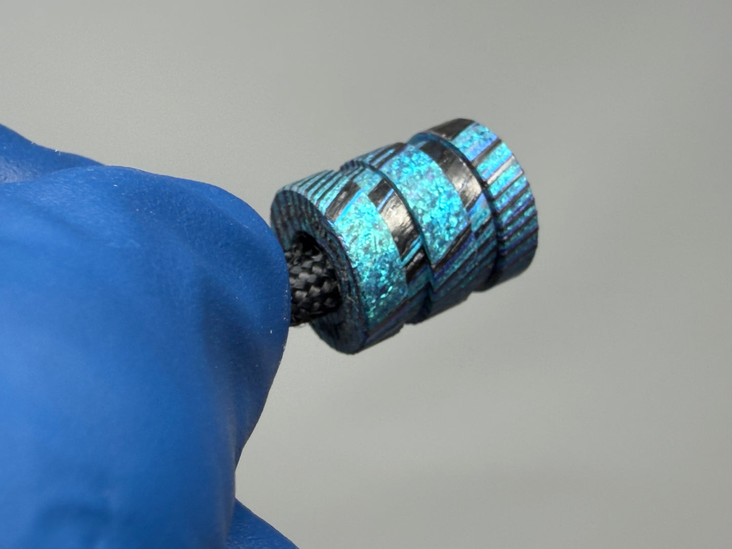 Teal Zircuti two line The End Bead