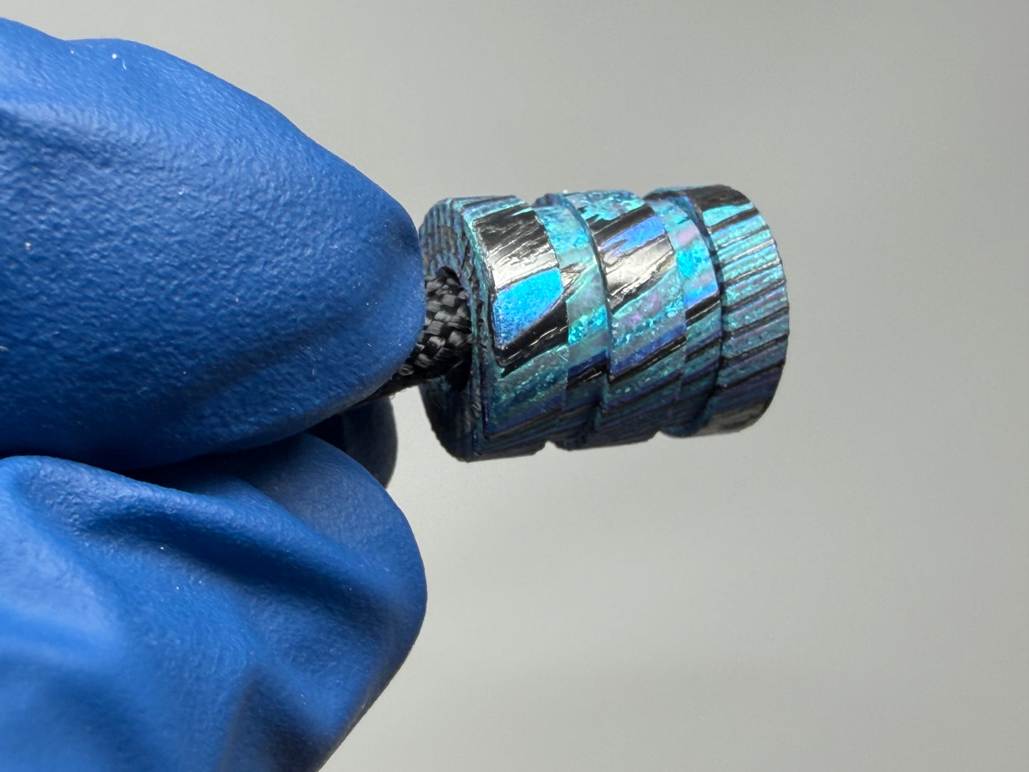 Teal Zircuti two line The End Bead