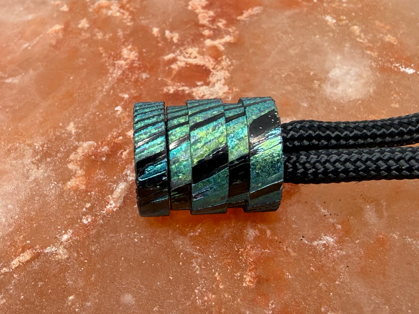 Green ZircuTi two line The End Bead