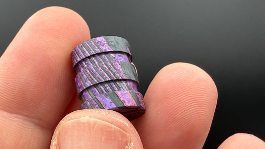 Purple, pink and gold Zircuti two line The End Bead