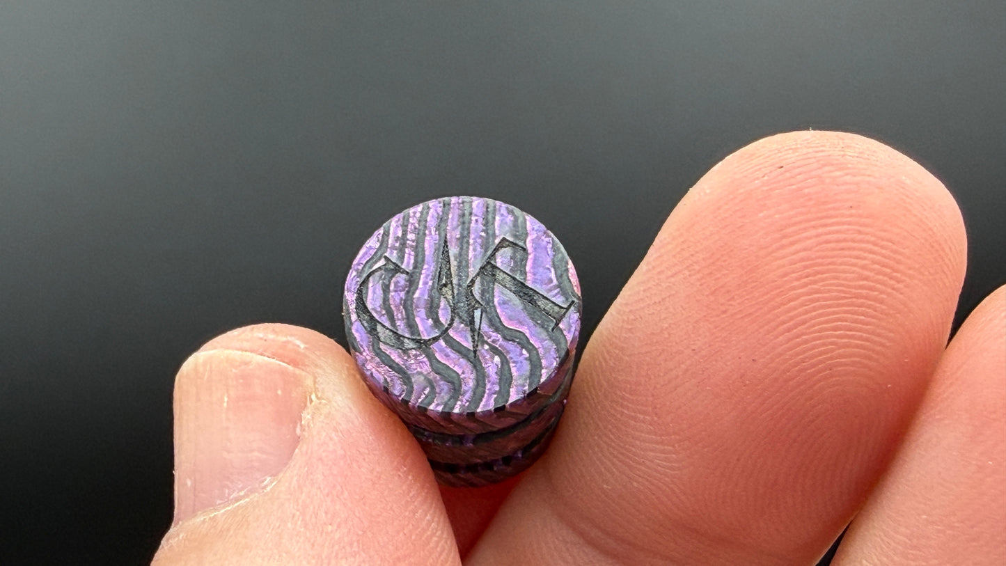 Purple, pink and gold Zircuti two line The End Bead